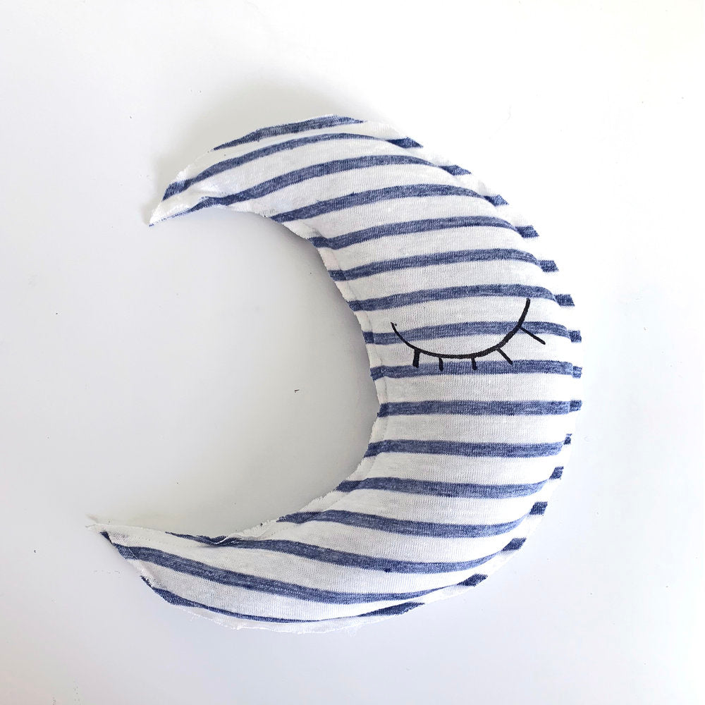 Crescent moon shaped striped pillow - Sleeping eyes print